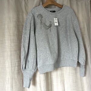 NWT beautiful EXPRESS balloon sleeve sweatshirt with rhinestone embellishment.